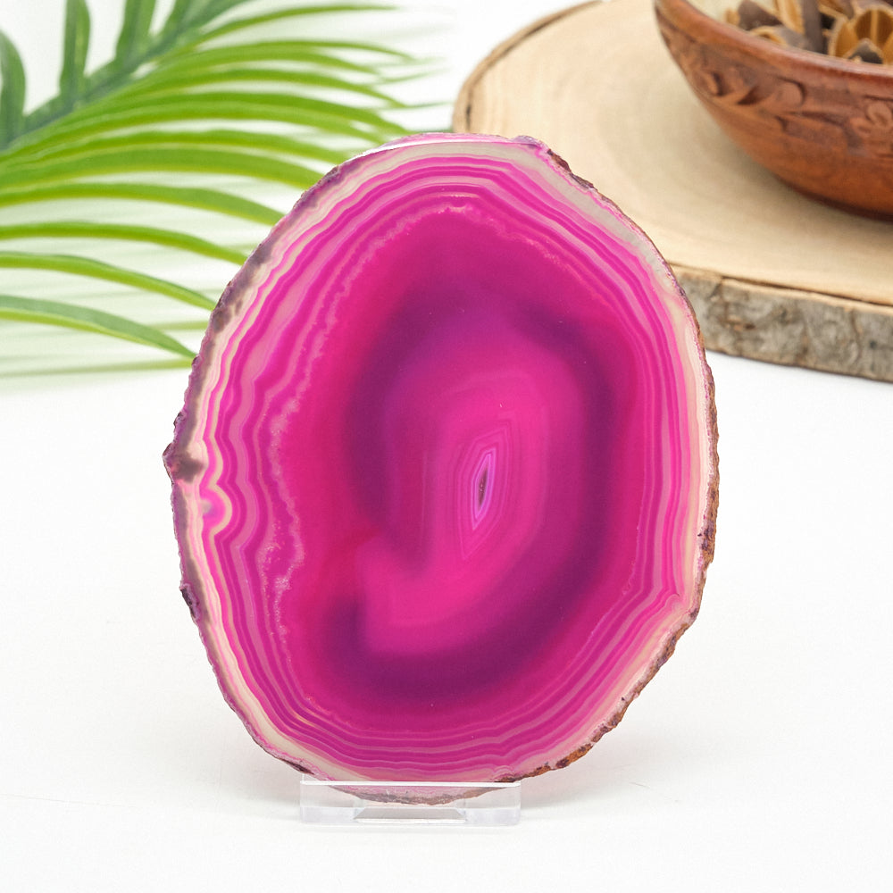 Close-up of a pink agate stone with a natural background