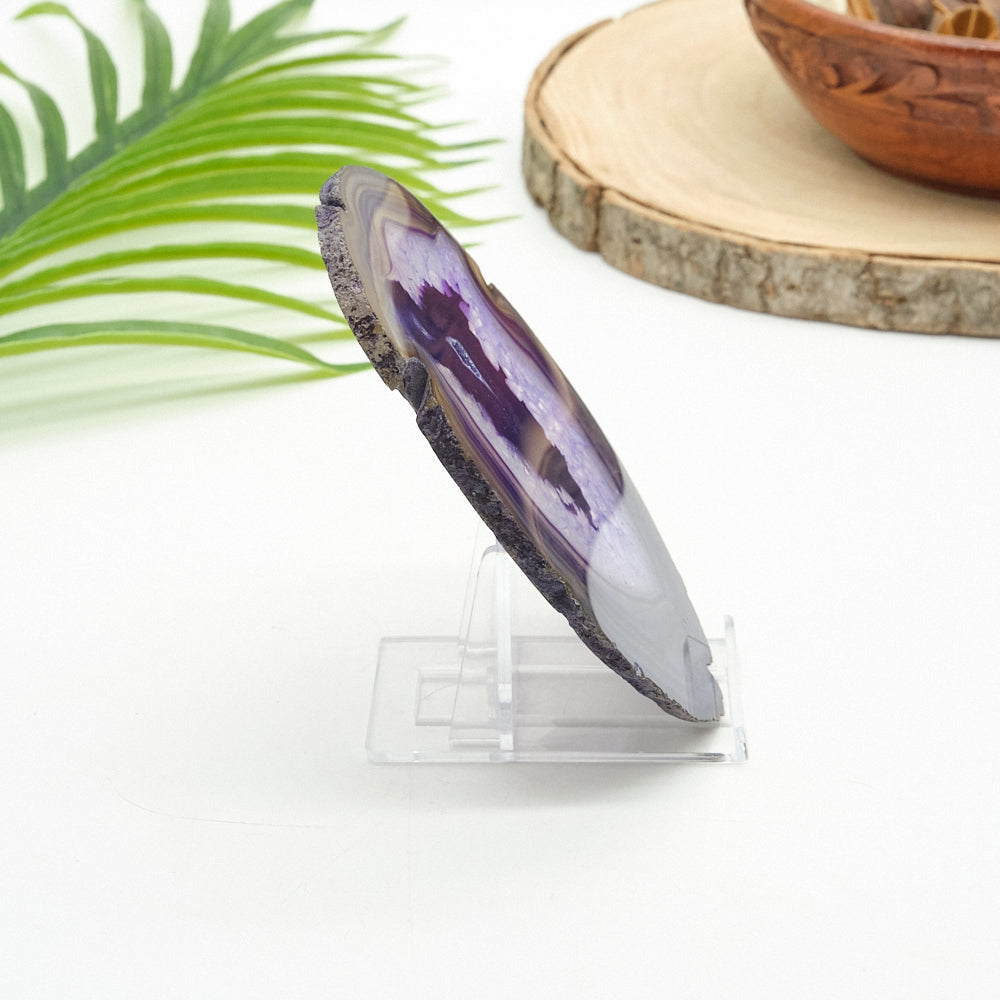 Decorative agate stone on a stand with a natural background