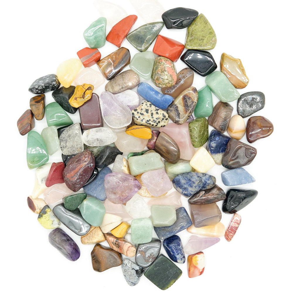 Assorted colorful stones on a white background