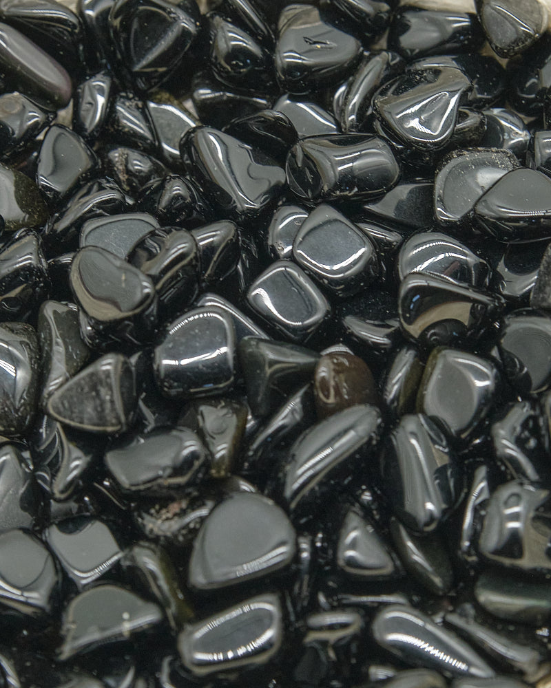 Close-up of Black Obsidian stones with a glossy finish