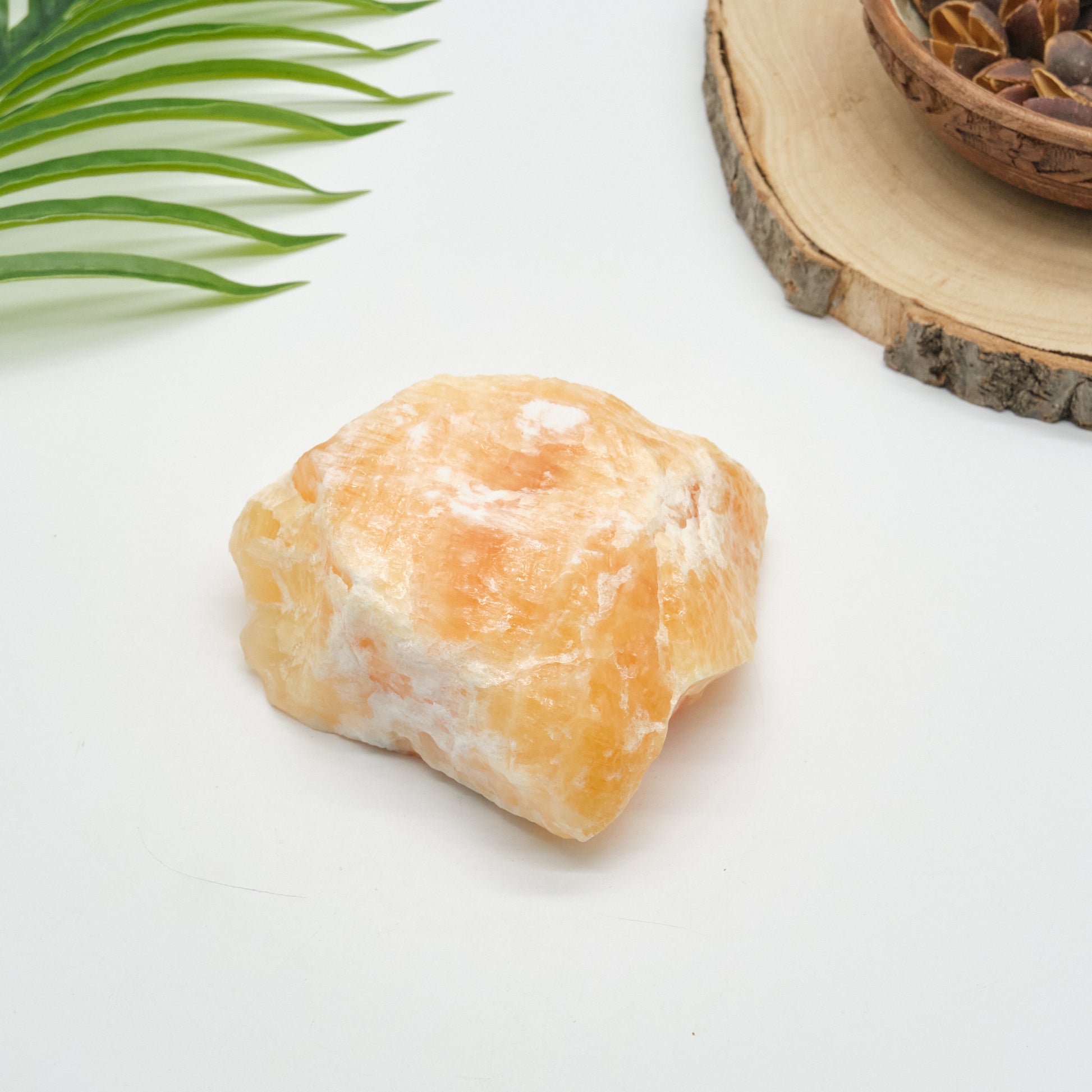 large raw orange calcite rock