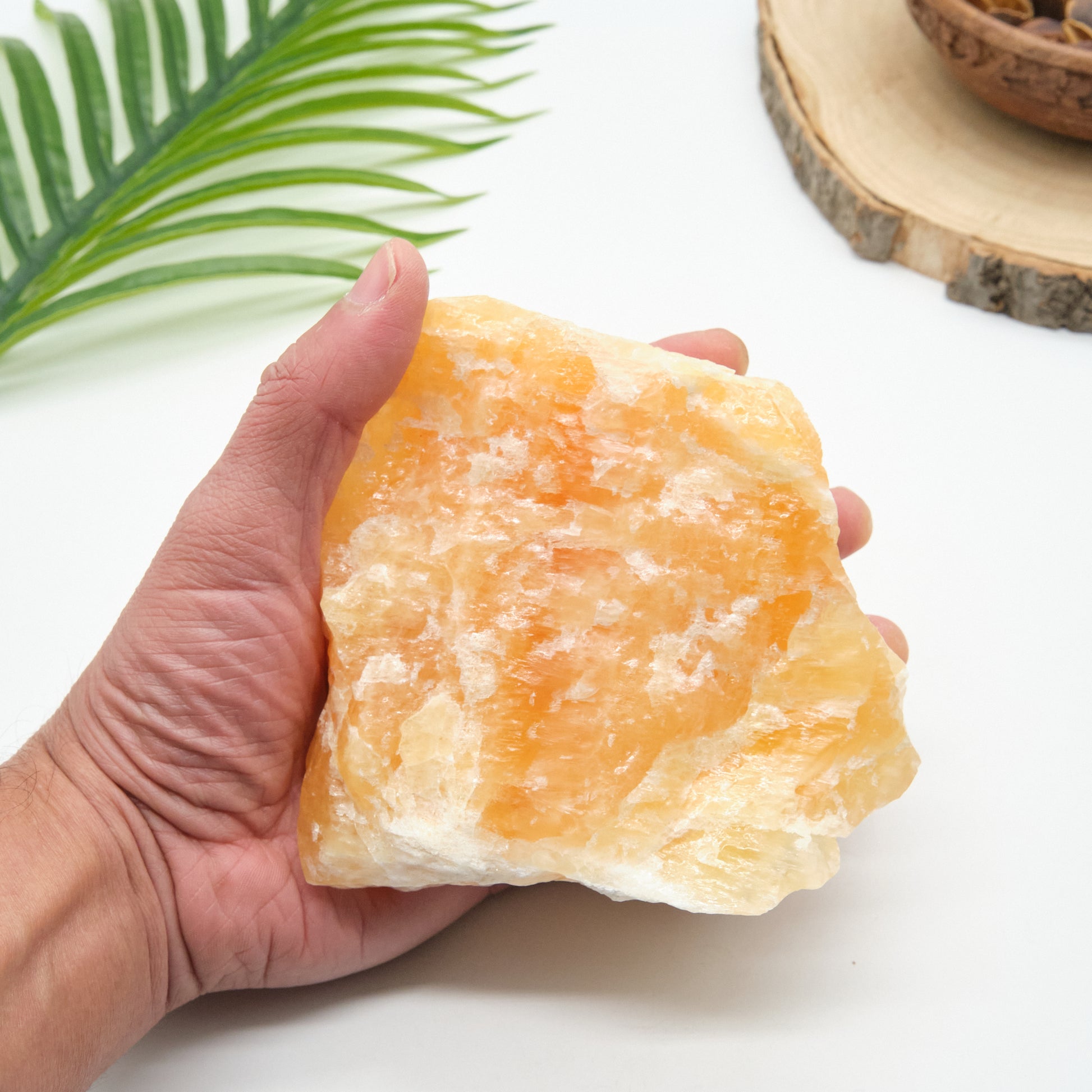 large raw orange calcite rock