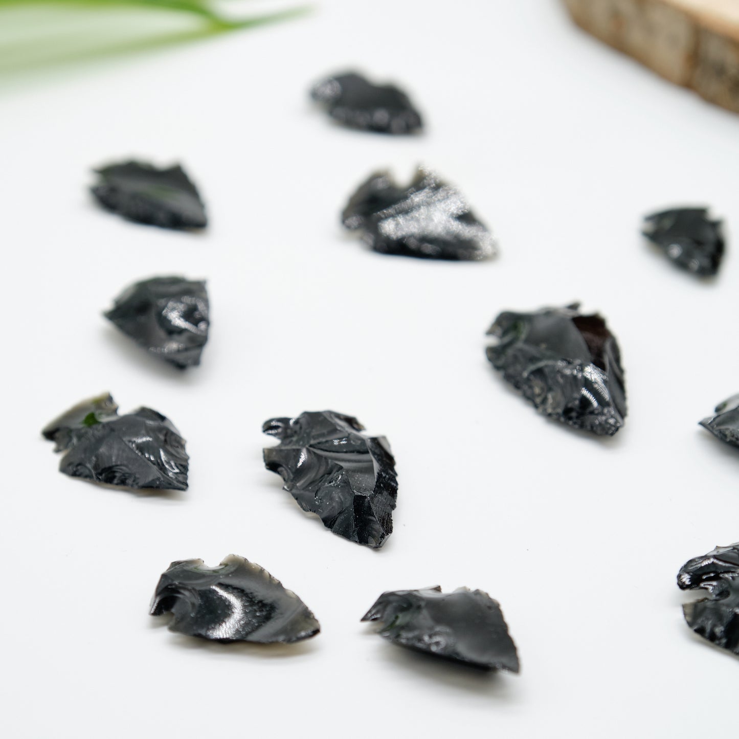 small black obsidian arrowhead carved rough crystal